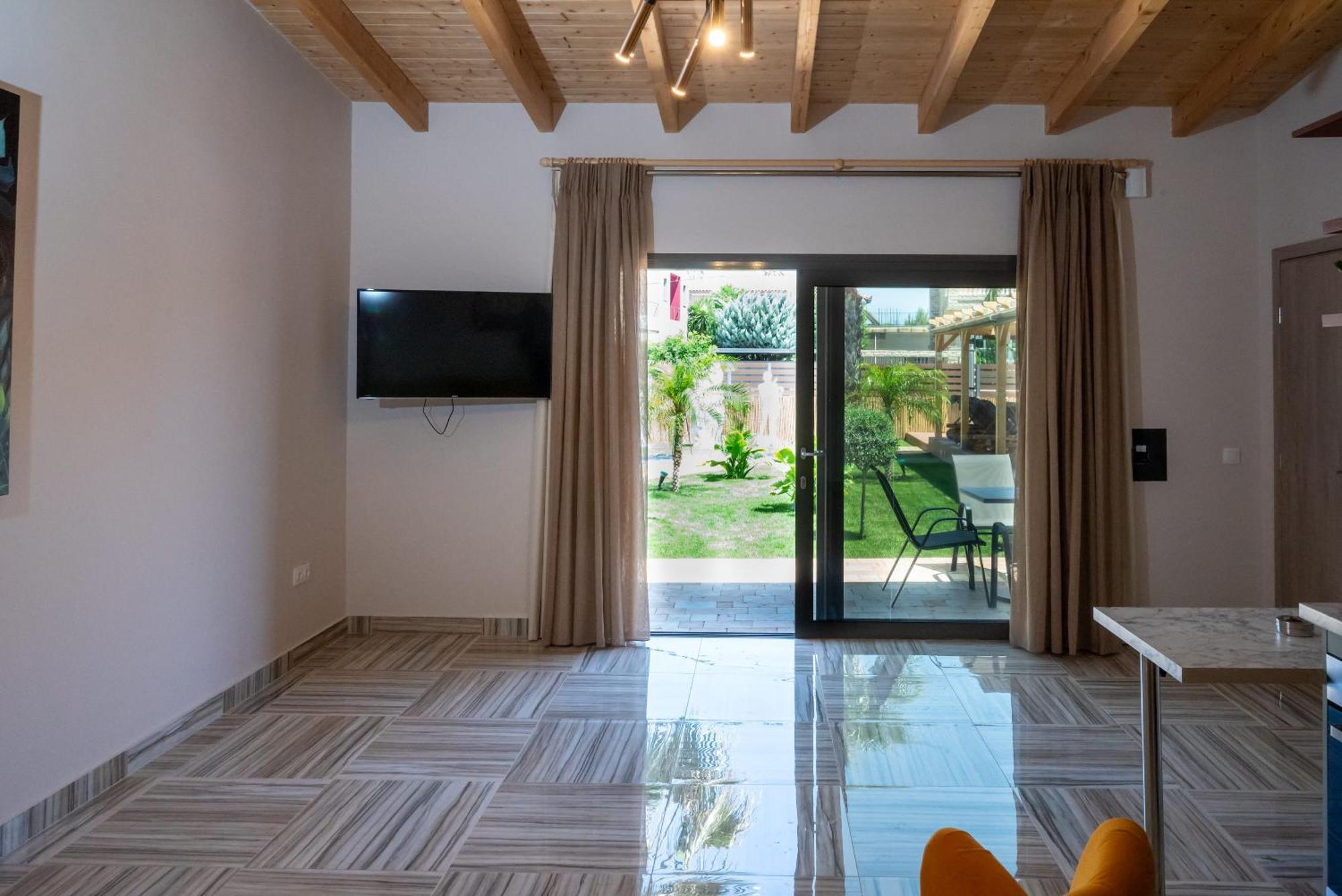 Paradise Apartments Artemida Bagian luar foto