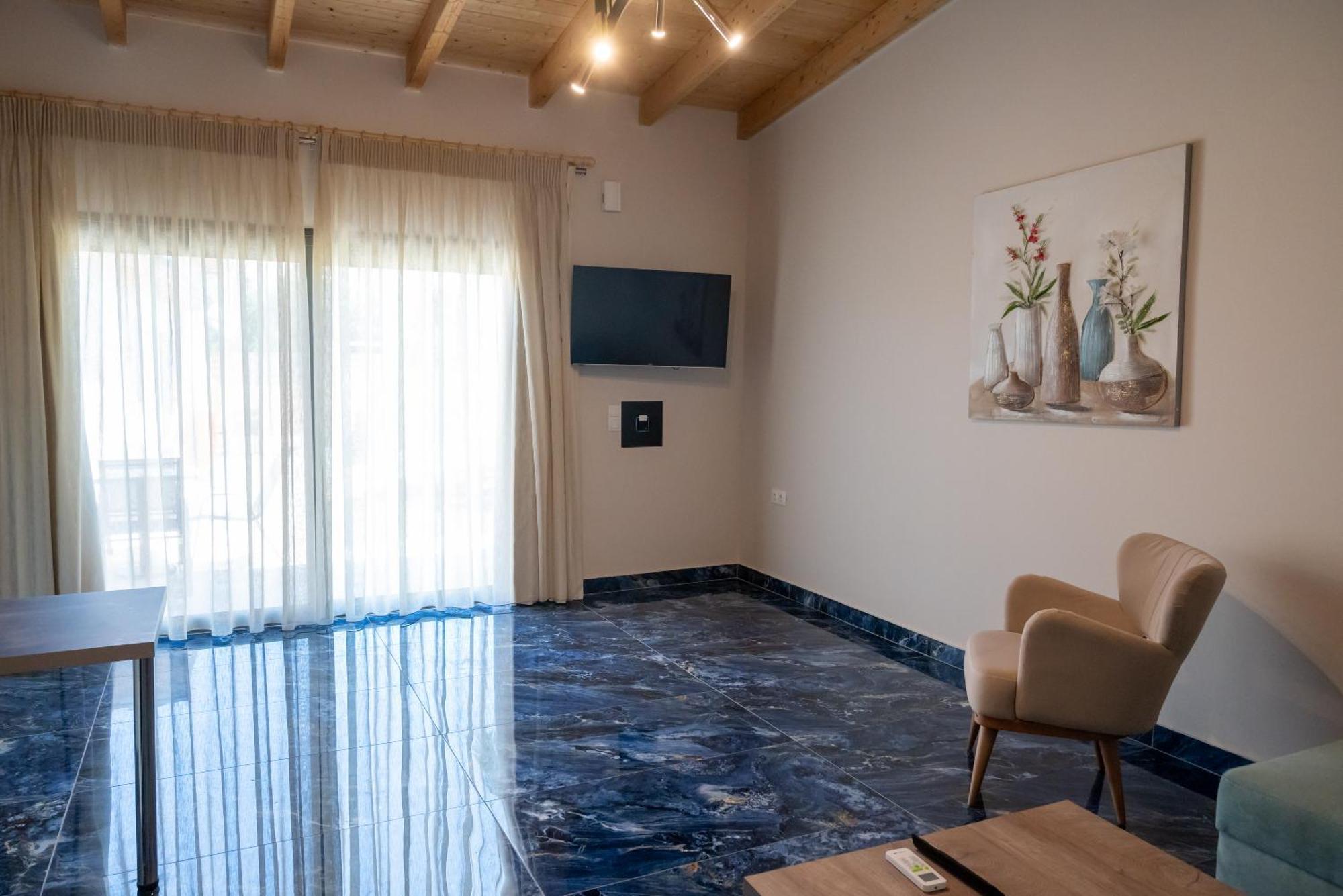 Paradise Apartments Artemida Bagian luar foto