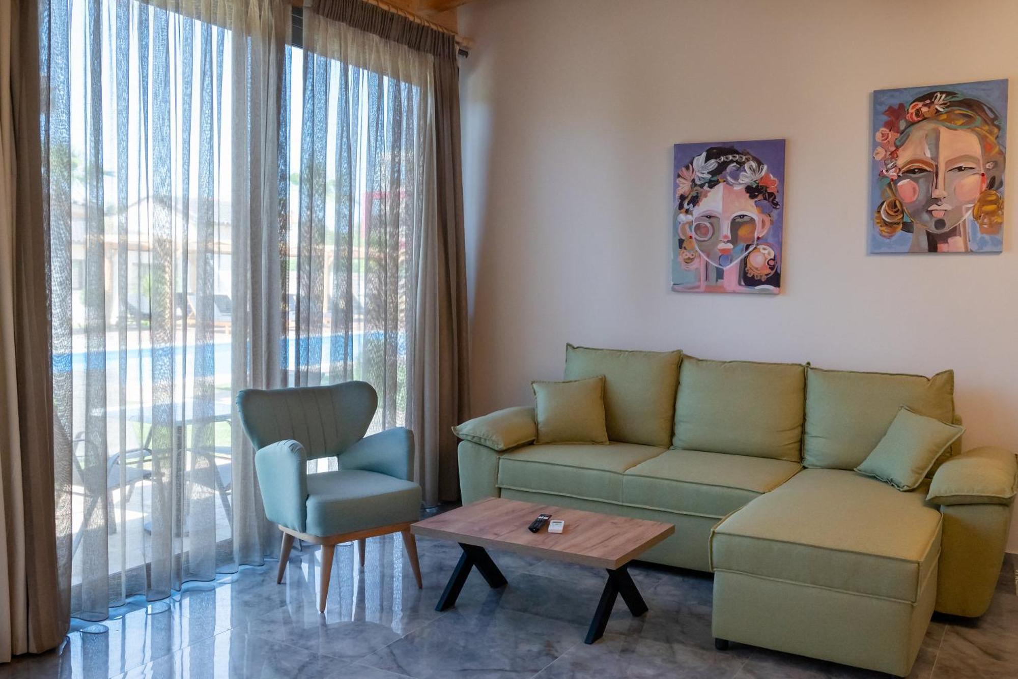 Paradise Apartments Artemida Bagian luar foto